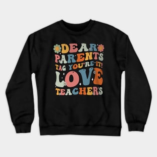 Groovy Dear Parents Tag Youre It Last Day Of School Teacher Crewneck Sweatshirt